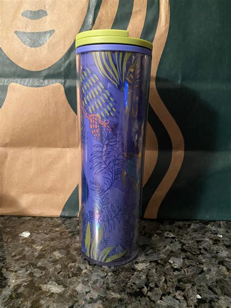 Pour a peppermint mocha into this hot cup and watch it change from holiday blue to holiday white. . Starbucks hawaii tumbler